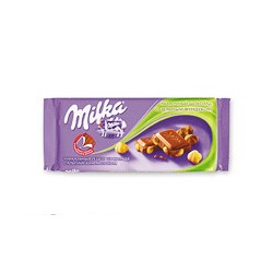 Шоколад плиточный Milka, молочный с цельным фундуком (100г)